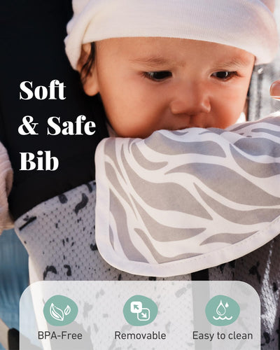 Parent wearing MOMTORY carrier in back-carry position illustrating balanced weight distribution for longer outings
