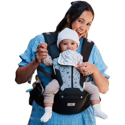 MOMTORY front view of black 6-in-1 carrier showing compact fit and safety buckles for secure wear