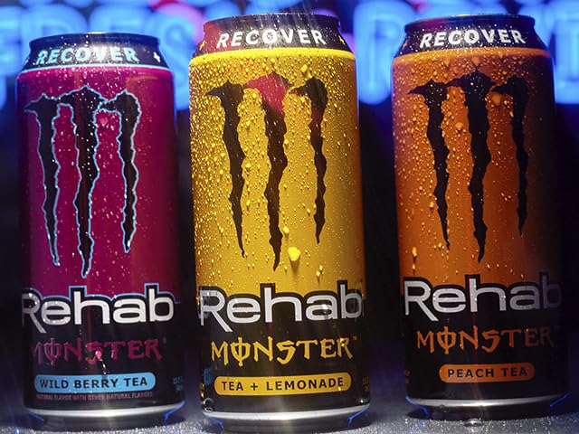 Monster Rehab poured into iced glass lifestyle shot showing refreshment benefit