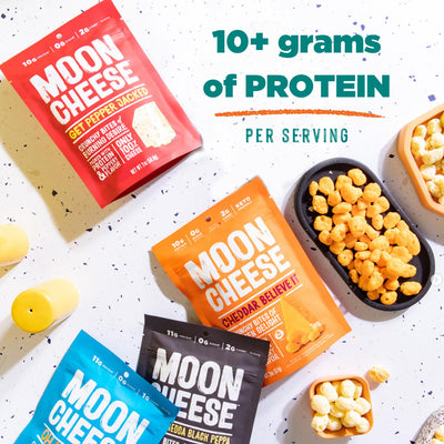 Moon Cheese opened bag detail revealing crispy cheddar pieces and resealable convenience