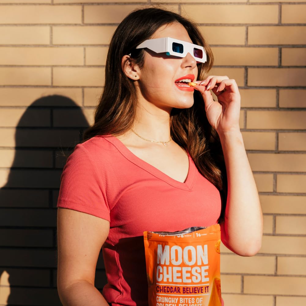 Moon Cheese inside a backpack illustrating portability and ready-to-eat travel benefit