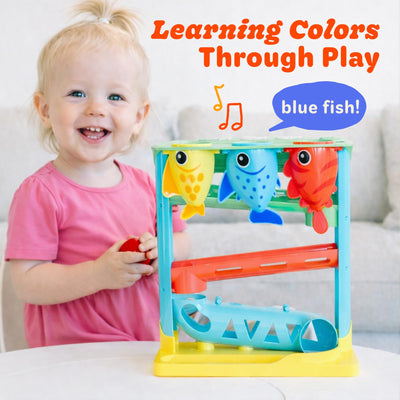 Move2Play baby using the toy, demonstrates fine motor skill development