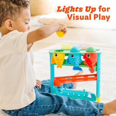 Move2Play balls beside an adult hand for size scale, clarifies safe dimensions