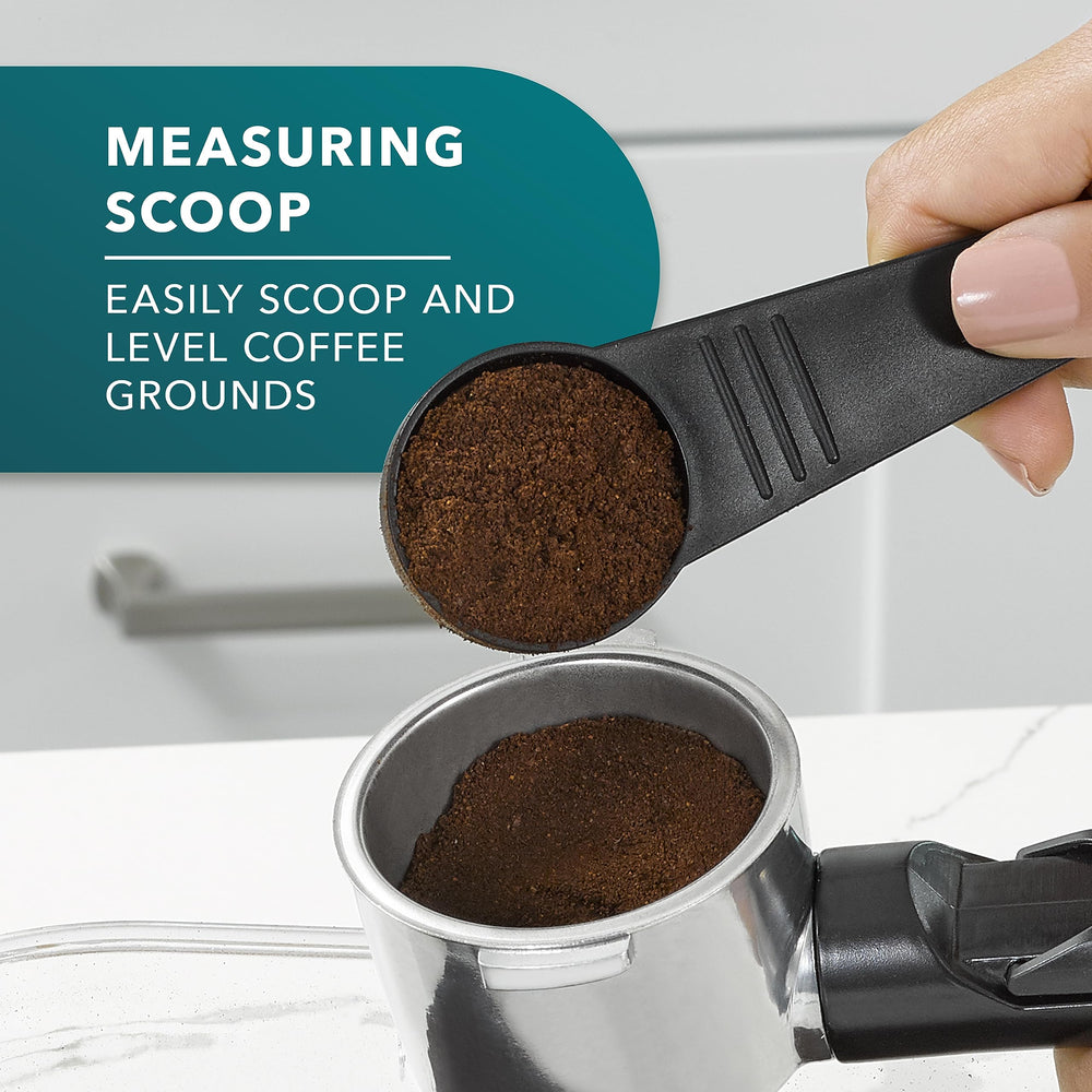 Mr. Coffee frothing wand closeup creating microfoam for silky lattes