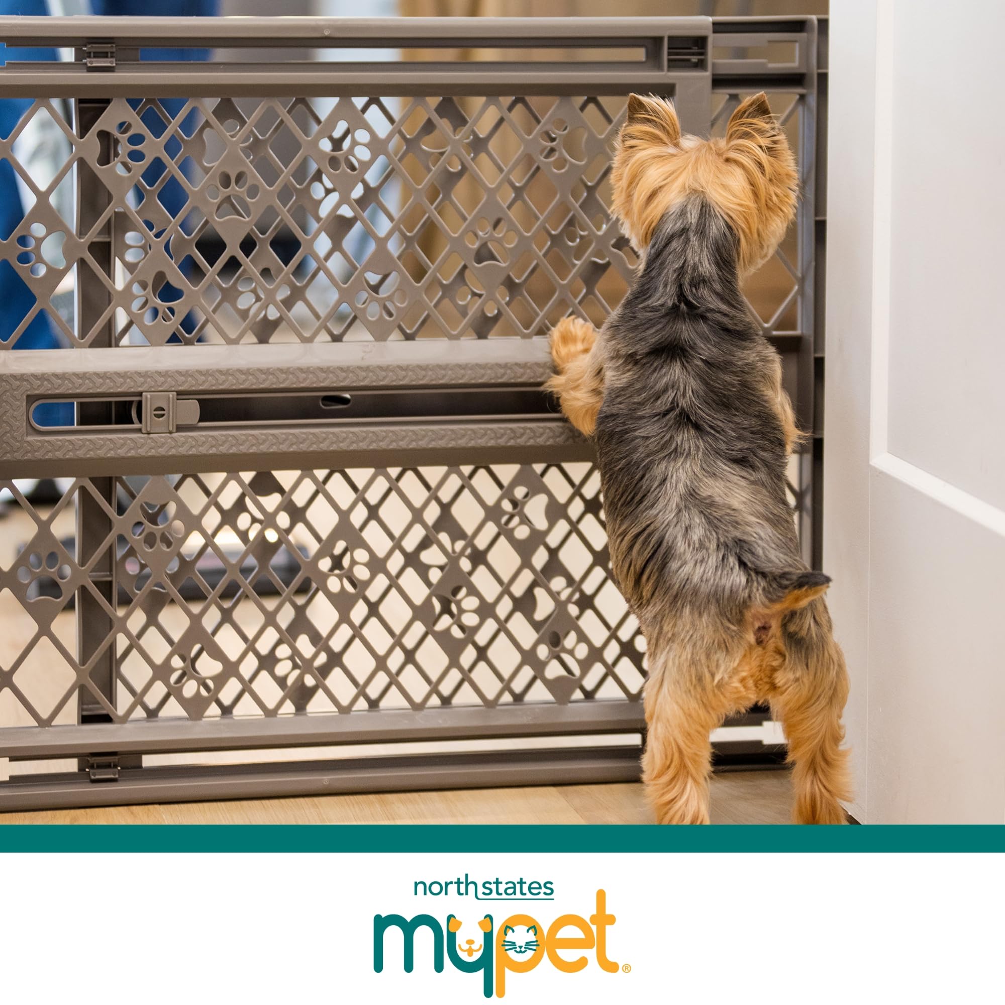 MYPET gate folded for storage illustrating compact portability and space-saving