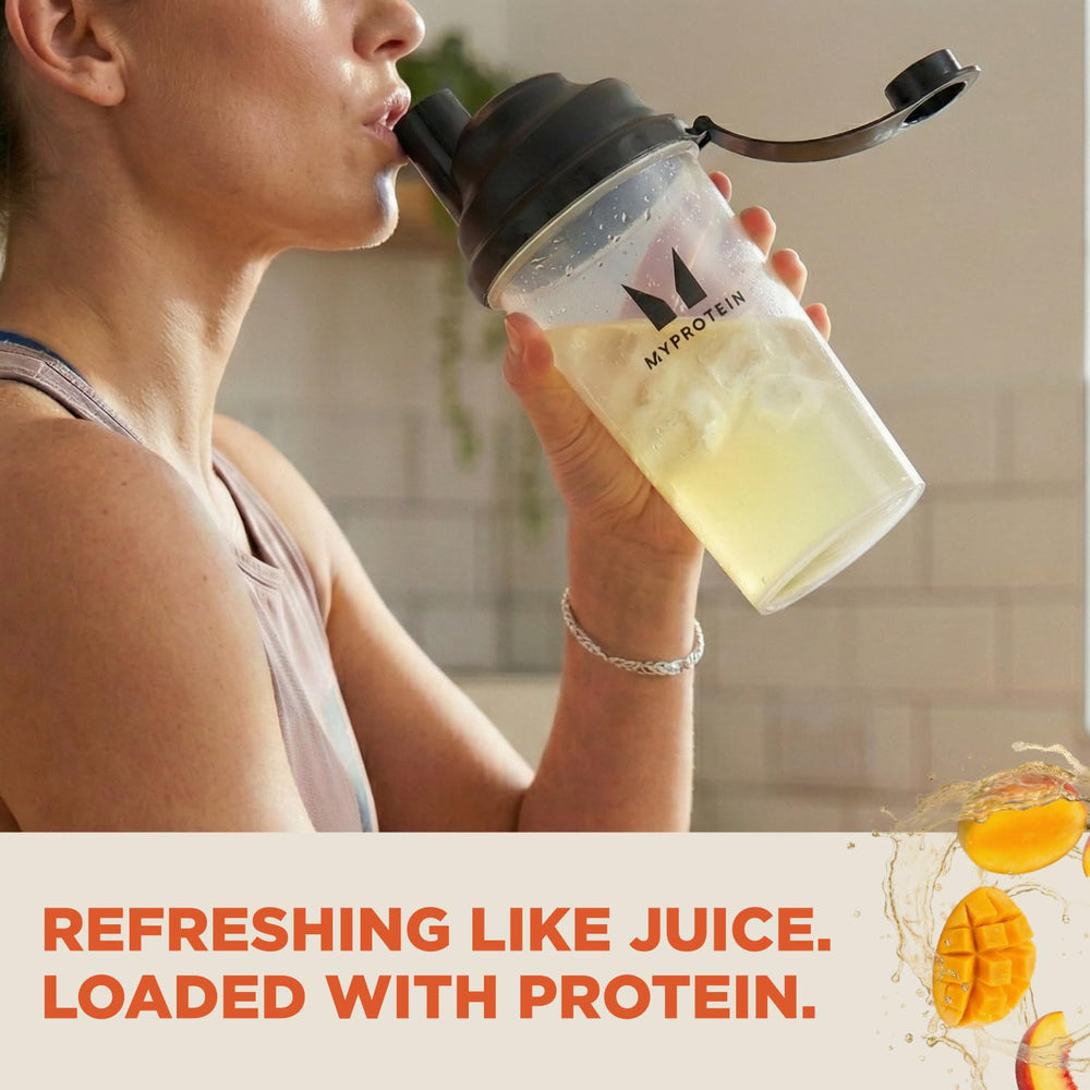 Myprotein mixed Peach Mango drink in glass offering refreshing hydration