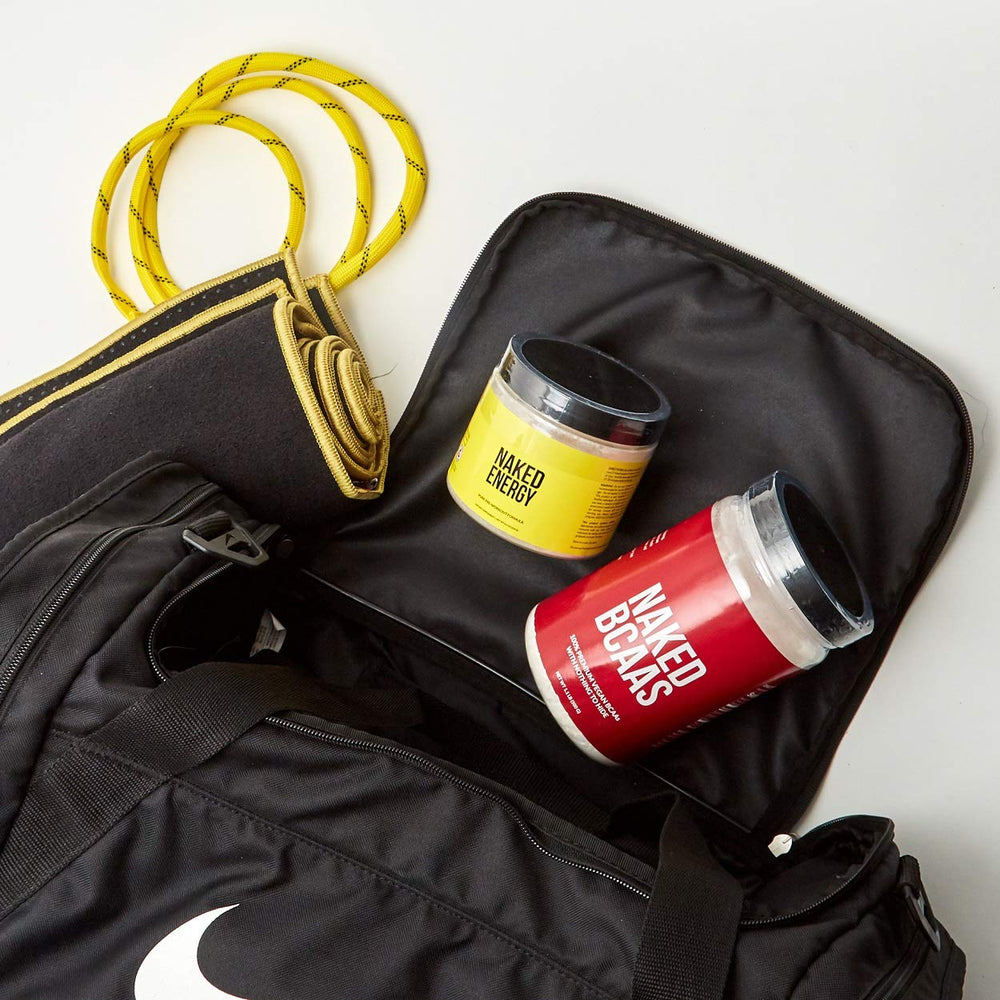 NAKED Energy en uso en gimnasio, aporta energía vegana antes de entrenar