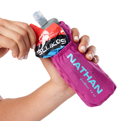Nathan ExoDraw in use by runner offering low-bounce hydration on trail