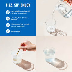Natural Vitality vaso con MaxCalm disuelto ilustrando bebida efervescente lista para consumir