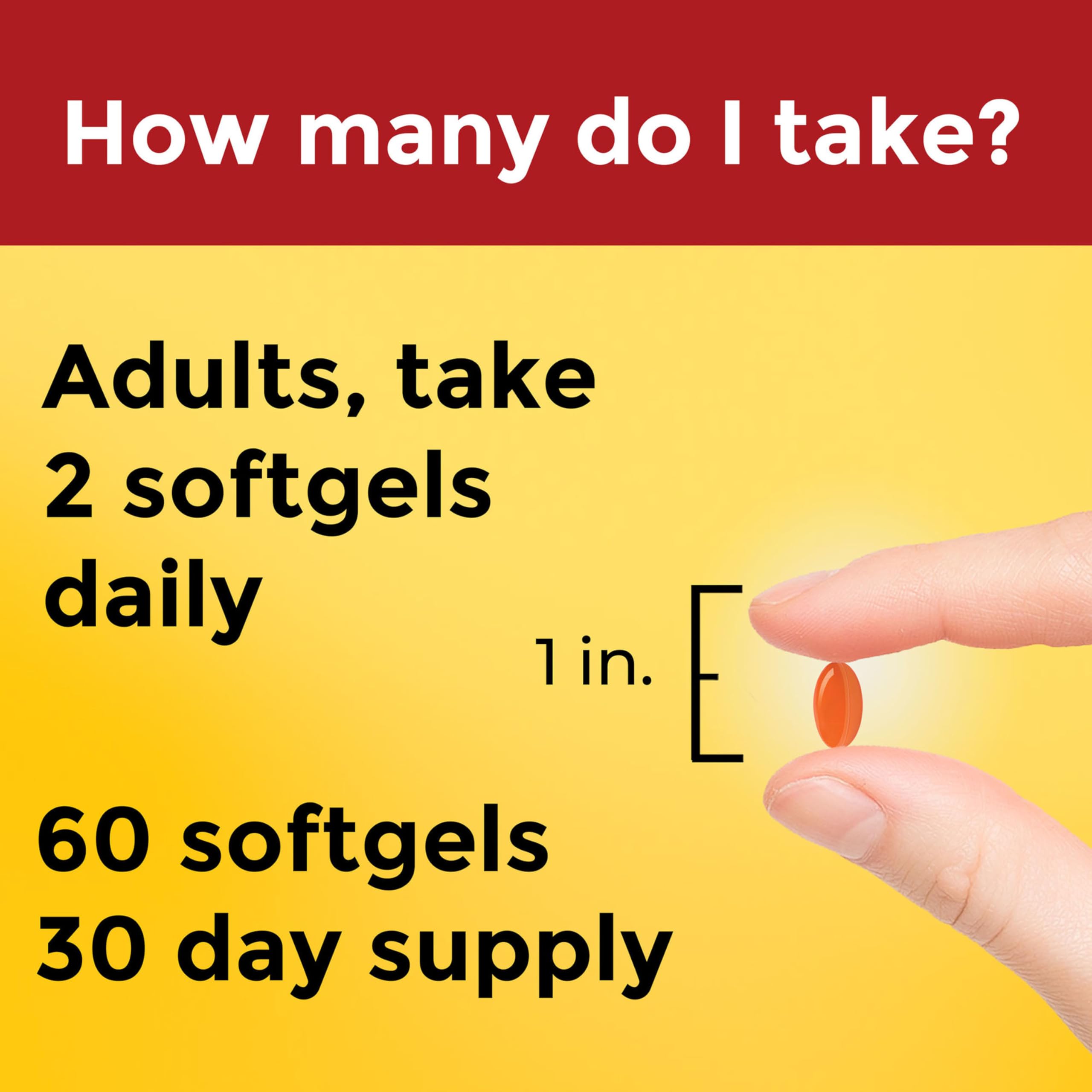 Nature Made softgel en mano para comparar escala y facilidad de ingesta