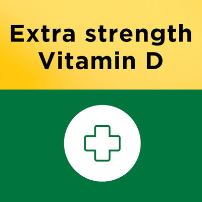 Several Nature Made softgels poured beside the bottle illustrating one-year 360-count supply benefit