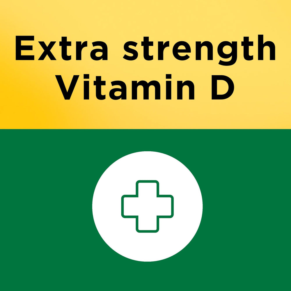 Several Nature Made softgels poured beside the bottle illustrating one-year 360-count supply benefit