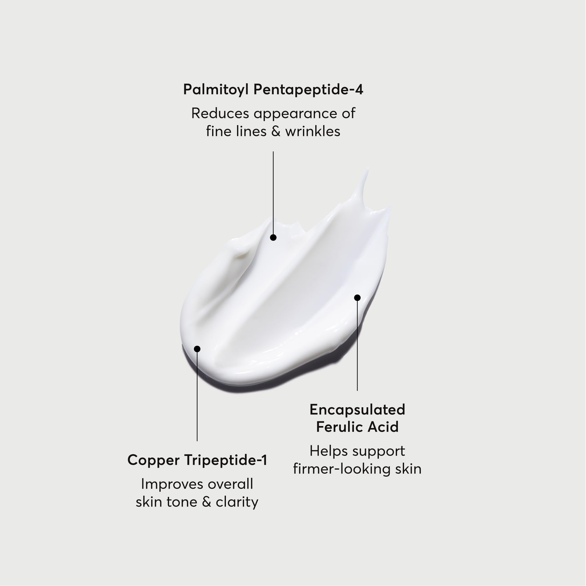 Naturium open cream on a cosmetic spoon showing rich texture and hydration
