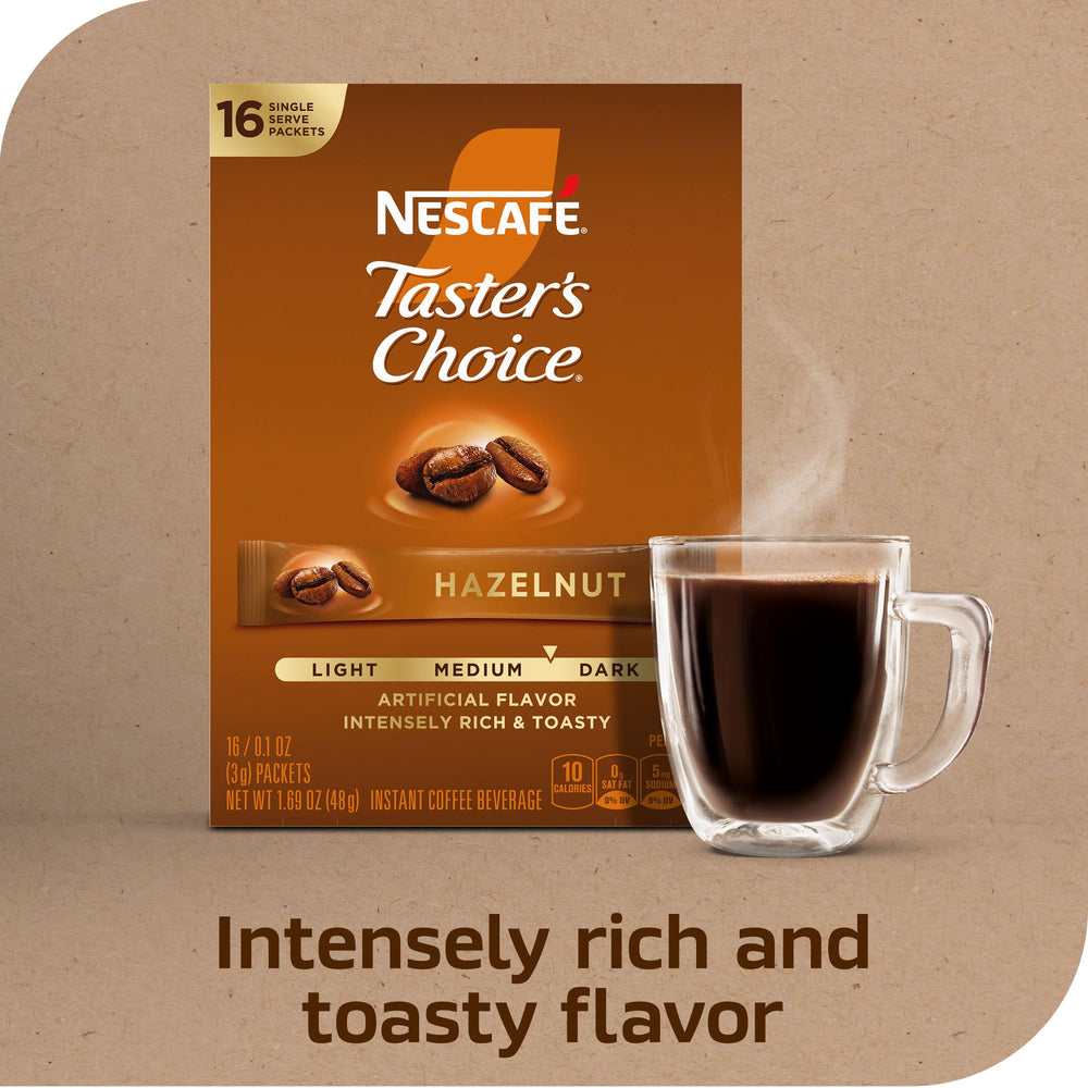 Opened NESCAFÉ packet poured into cup highlighting instant brewing convenience