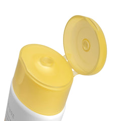 Neutrogena tubo 3 fl oz junto a objetos para comparar tamaño portátil
