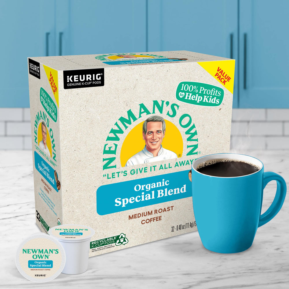 Newman's Own K-Cup pod inside a Keurig machine, demonstrates fast single-serve brewing benefit