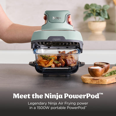 Ninja Crispi 4‑qt container roasting a whole chicken for family-sized meals