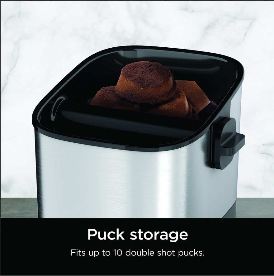 Ninja knock box open interior with espresso pucks showing 10-puck storage benefit