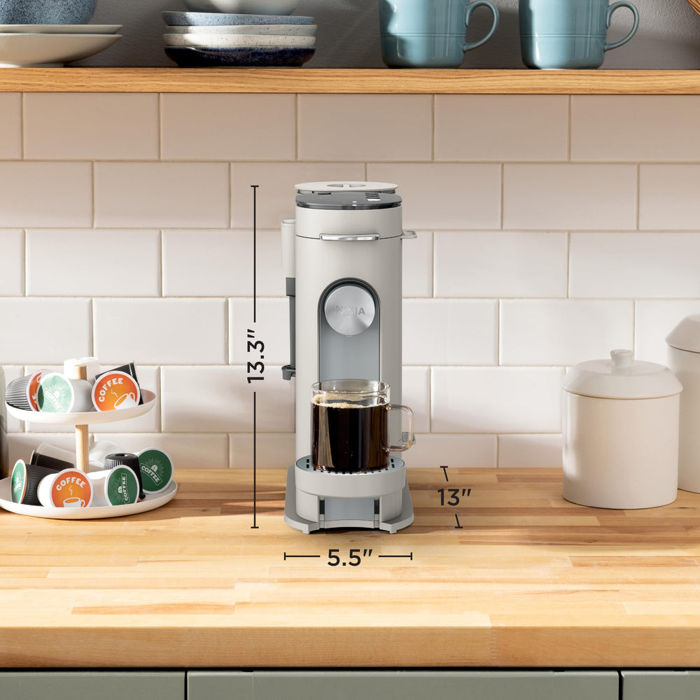 Ninja PB051ST fold-away frother detail creating silky foam for lattes and cappuccinos