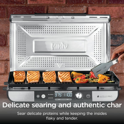 Ninja Sizzle Pro XL removable grease catch detail for cleaner counters and easy disposal