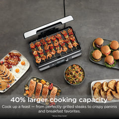 Ninja Sizzle Pro XL griddle plate close-up highlighting nonstick ceramic surface for easy release