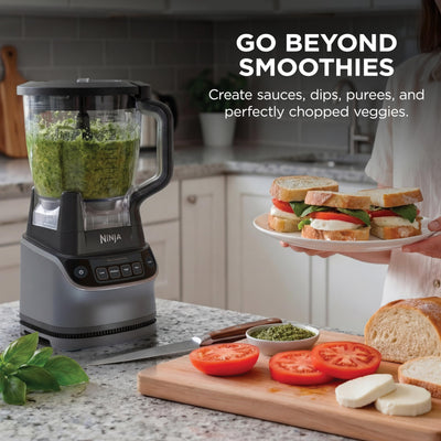 Ninja UltraCrush Pro pouring a fresh smoothie, demonstrating fast blending benefit