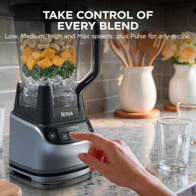 Ninja UltraCrush Pro crushing ice into fine snow for resort-style frozen drinks