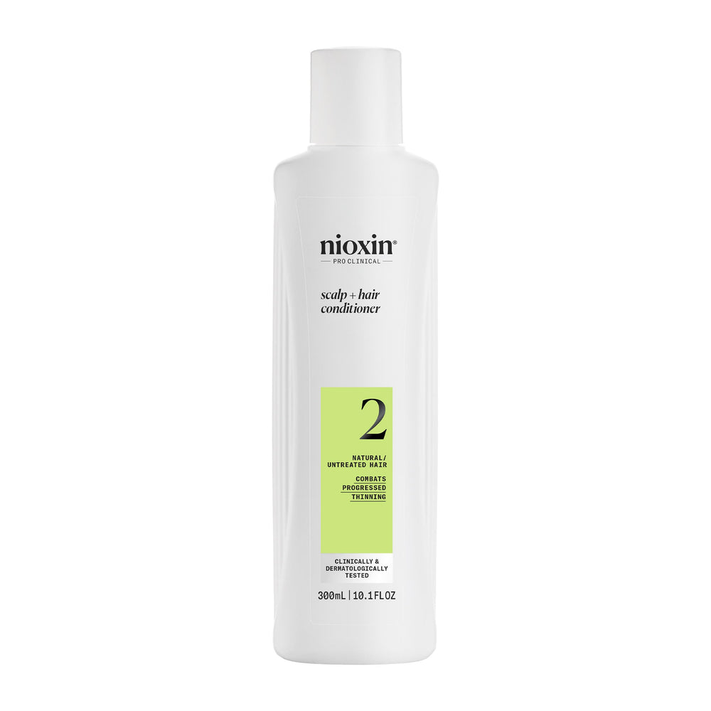Nioxin envase frontal mostrando presentación profesional y beneficio de densidad