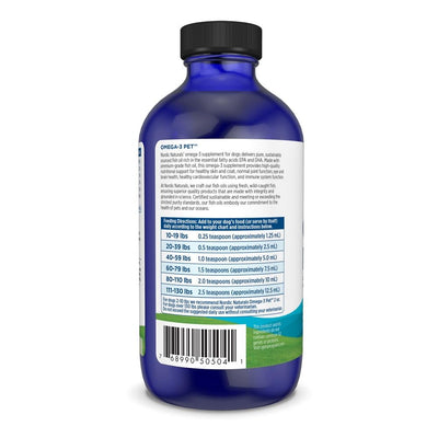 Nordic Naturals frasco junto a mano para comparación de tamaño, muestra cantidad