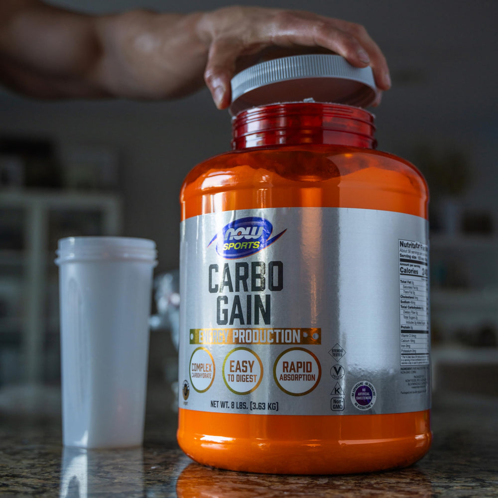 NOW Foods Carbo Gain label close-up showing GMP certification benefit