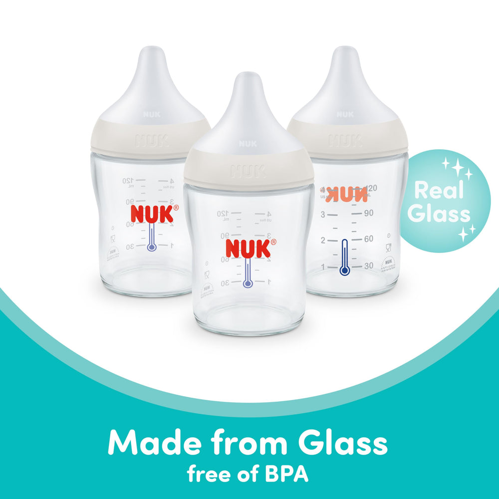NUK biberón lateral con tapa segura para almacenamiento higiénico