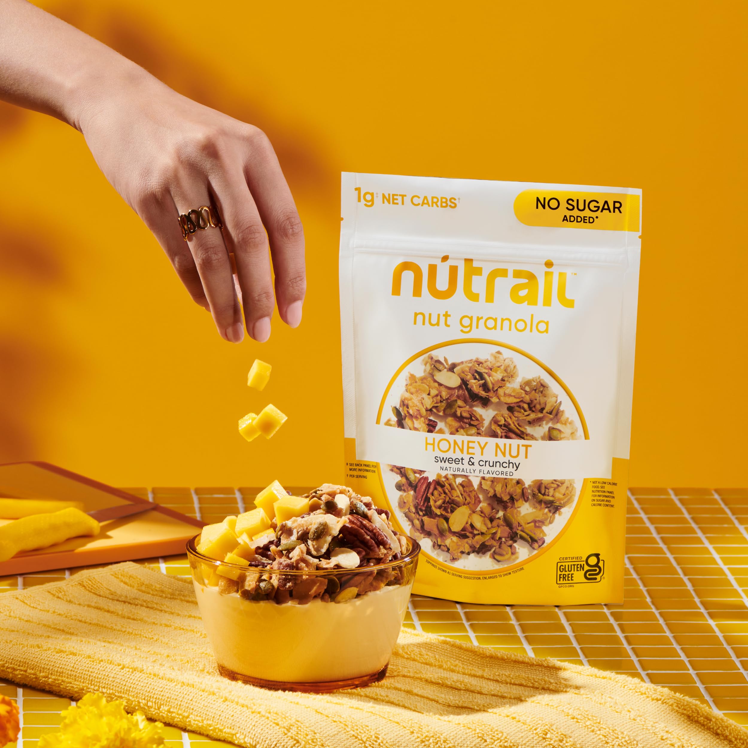 NuTrail porción en cuchara que muestra control de raciones y bajo en carbohidratos