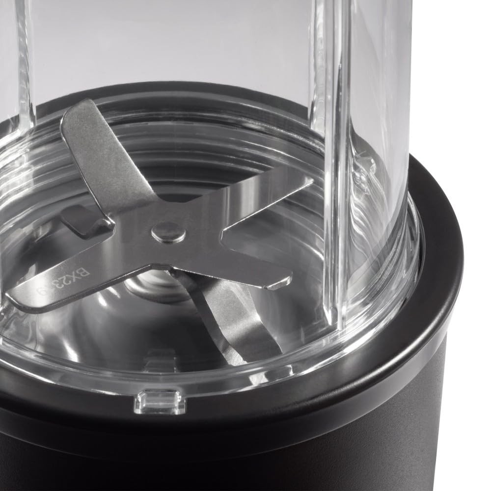 NutriBullet cups and flip-top lids arranged showing portability and convenience