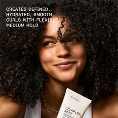 Coconut and avocado ingredients near Olaplex No.10 illustrating nourishment benefits