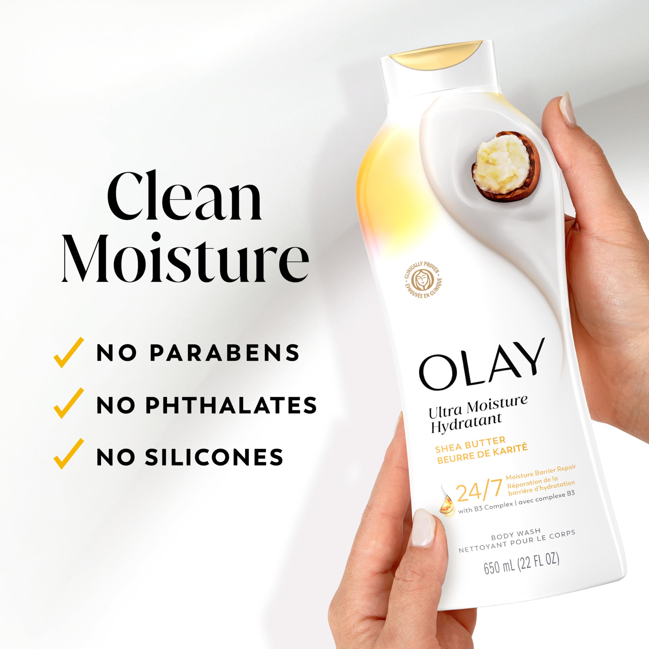 Botella Olay junto a un objeto para comparar su tamaño y capacidad clara