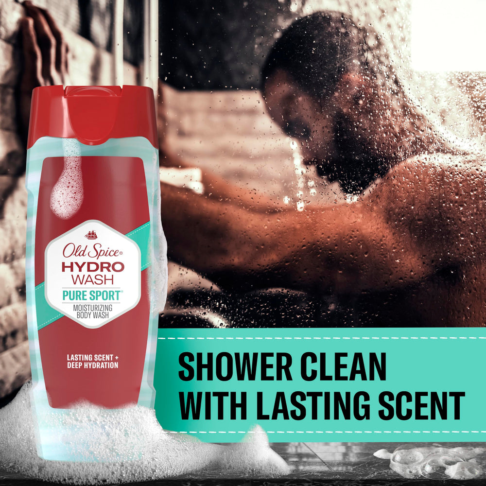 Old Spice Hydro Wash bottle in hand showing 16 oz size and travel convenience