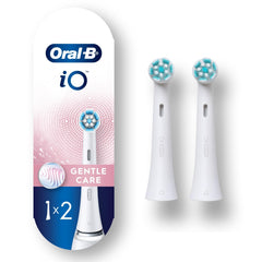 Oral-B iO empaque frontal mostrando dos cabezales y compatibilidad