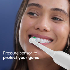 Oral-B handle detail showing pressure sensor that protects gums by reducing over-brushing