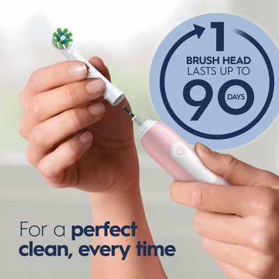 Oral-B electric toothbrush in use at sink demonstrating effective plaque removal