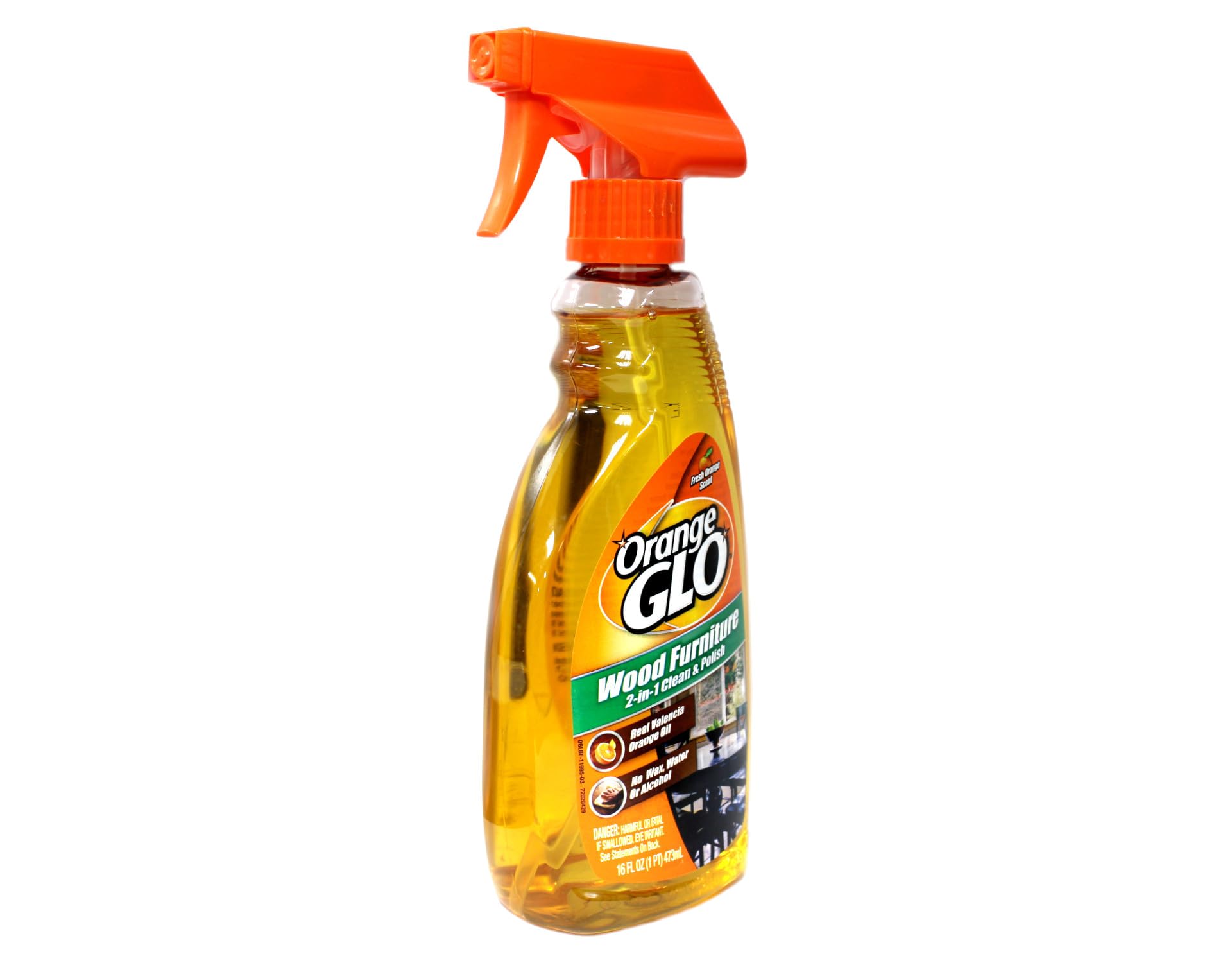 ORANGE GLO spray en uso sobre mesa de madera, facilita limpieza rápida