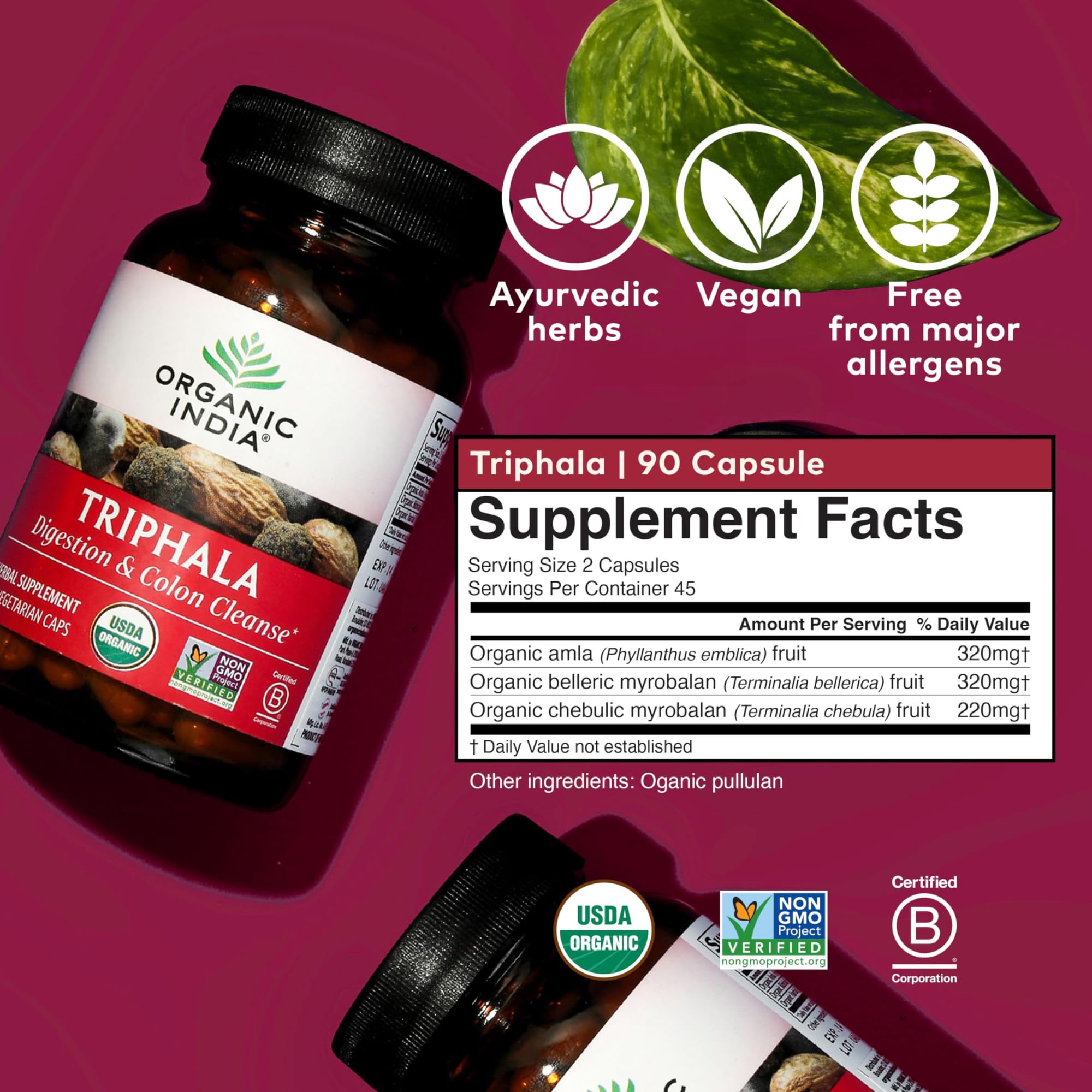 Ambiente de uso: Triphala de ORGANIC INDIA cerca de un vaso de agua y frutas