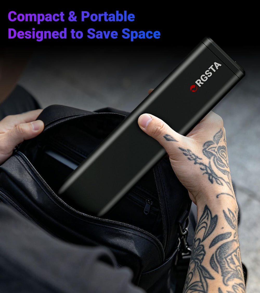 ORGSTA held in hand to show scale and travel-ready convenience