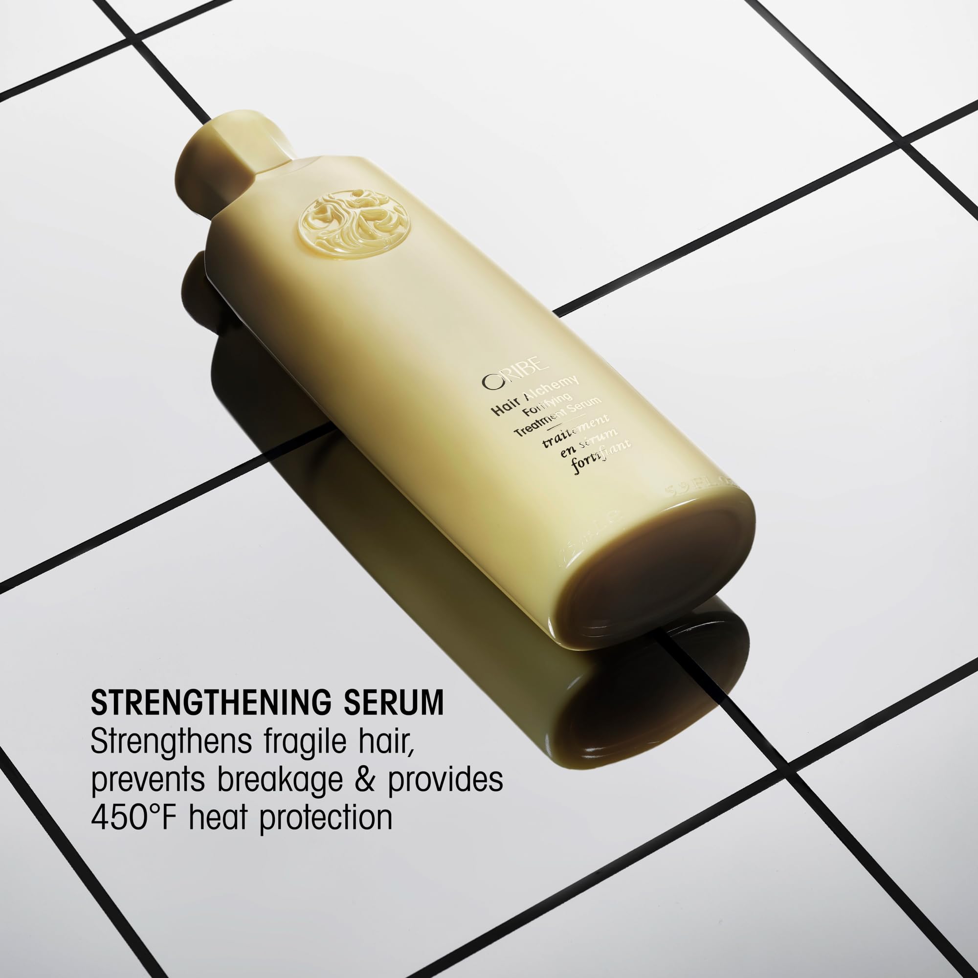 Oribe Hair Alchemy pump close-up demonstrating easy, controlled dispensing