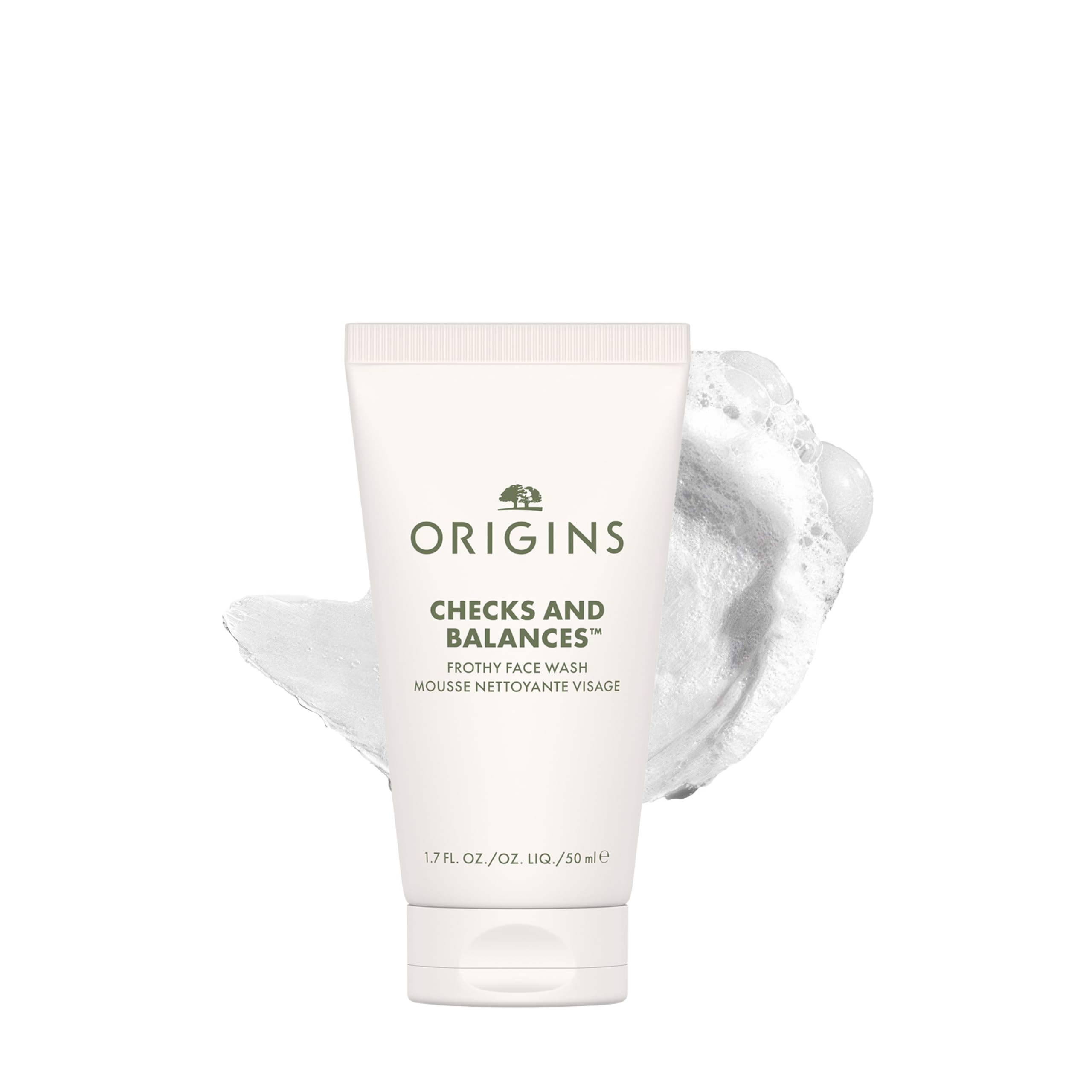 Origins envase frontal tamaño viaje mostrando limpieza conveniente