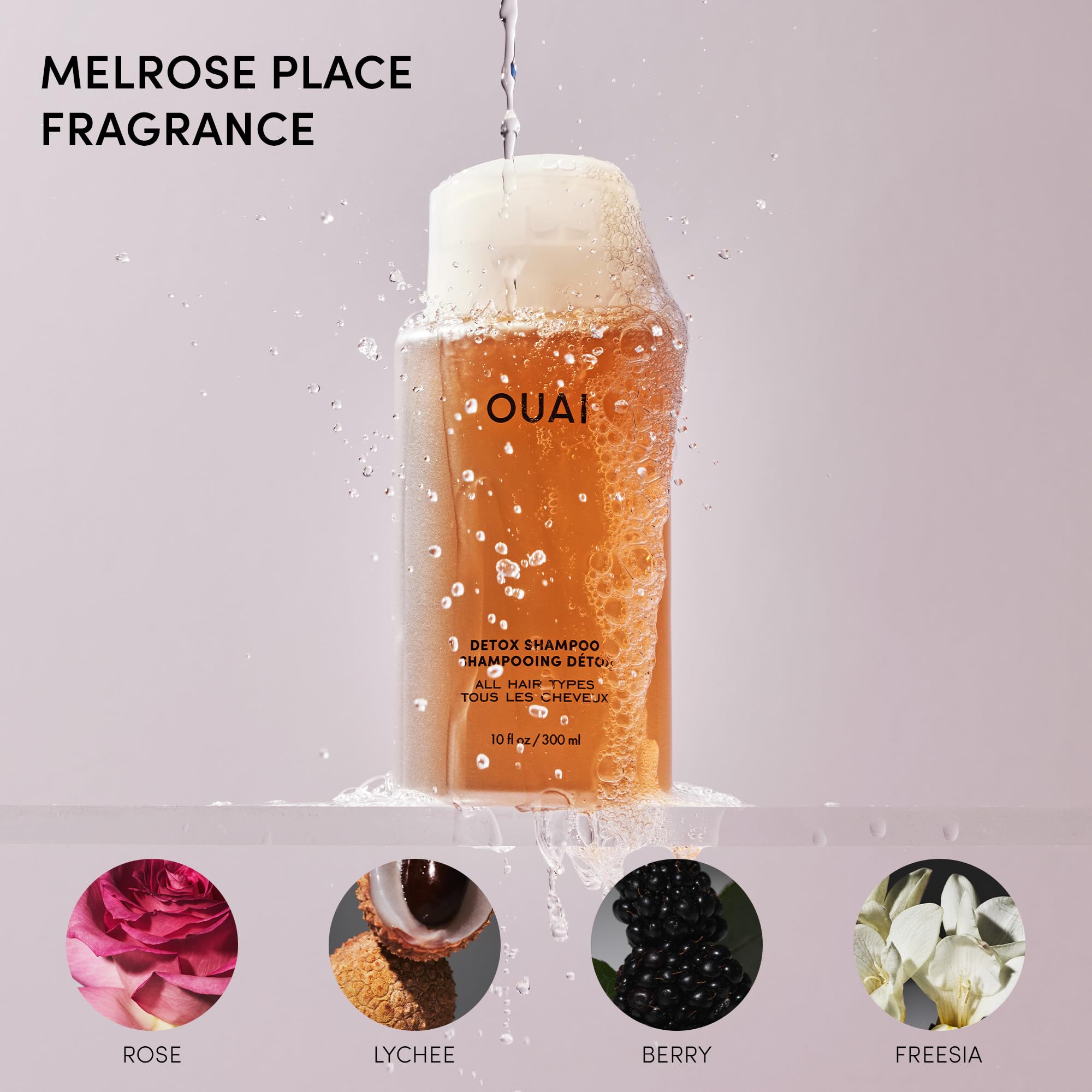 OUAI champú Detox junto a regla para comparar tamaño 16 oz utilidad