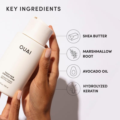 OUAI conditioner being applied to wet hair for easier detangling