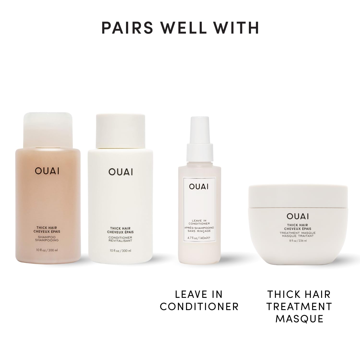 OUAI bottles held in hand showing true 10 oz scale