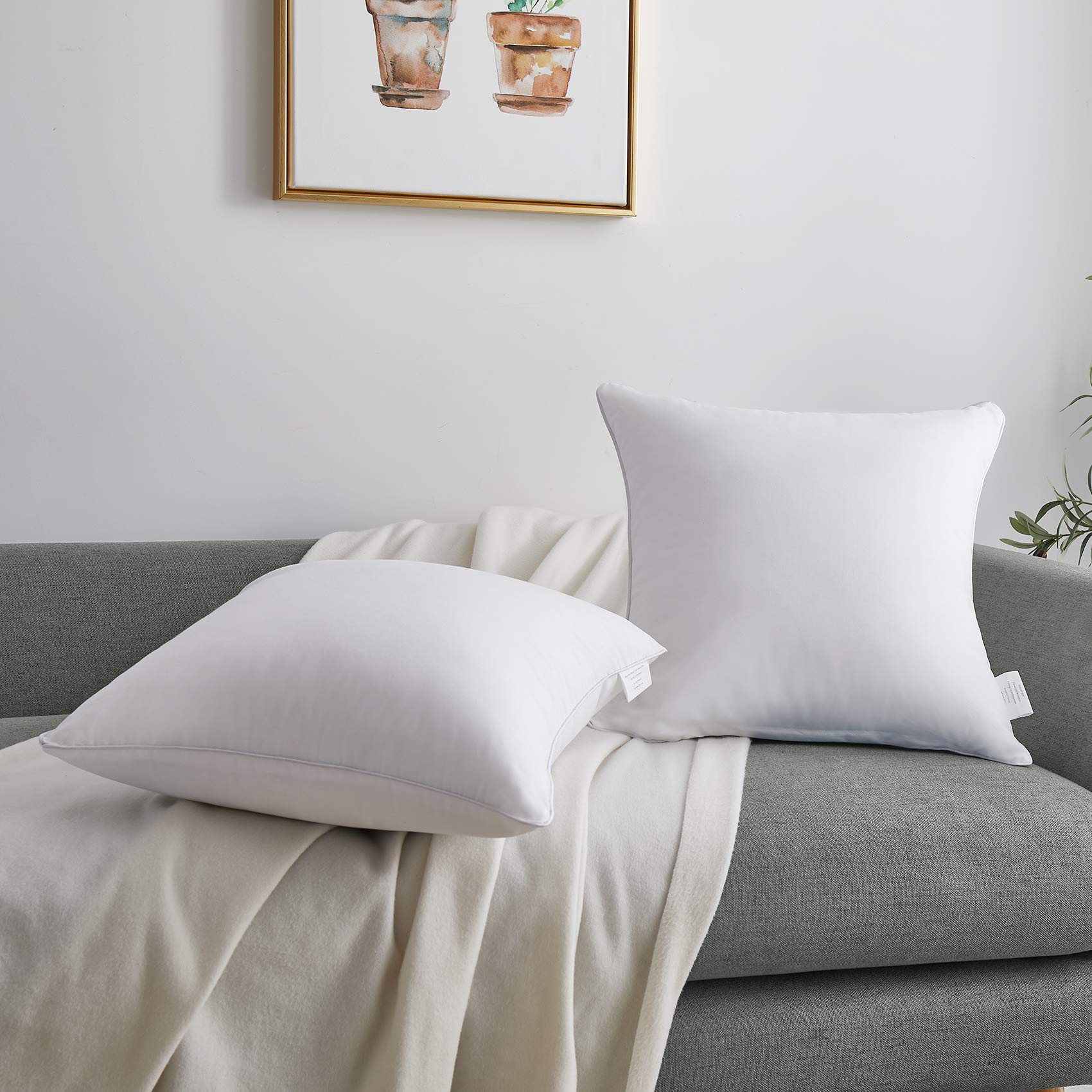 Oubonun inserts arranged on a bed enhancing layered bedroom decor and comfort