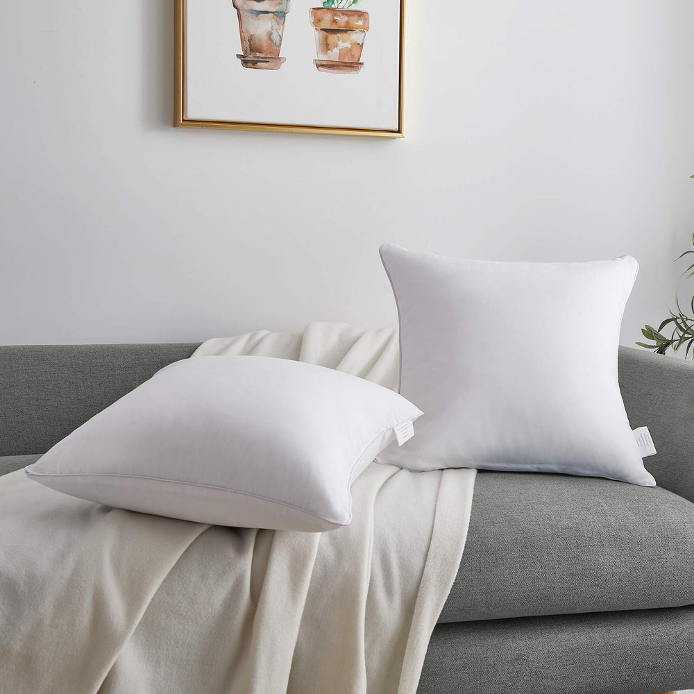 Oubonun inserts arranged on a bed enhancing layered bedroom decor and comfort