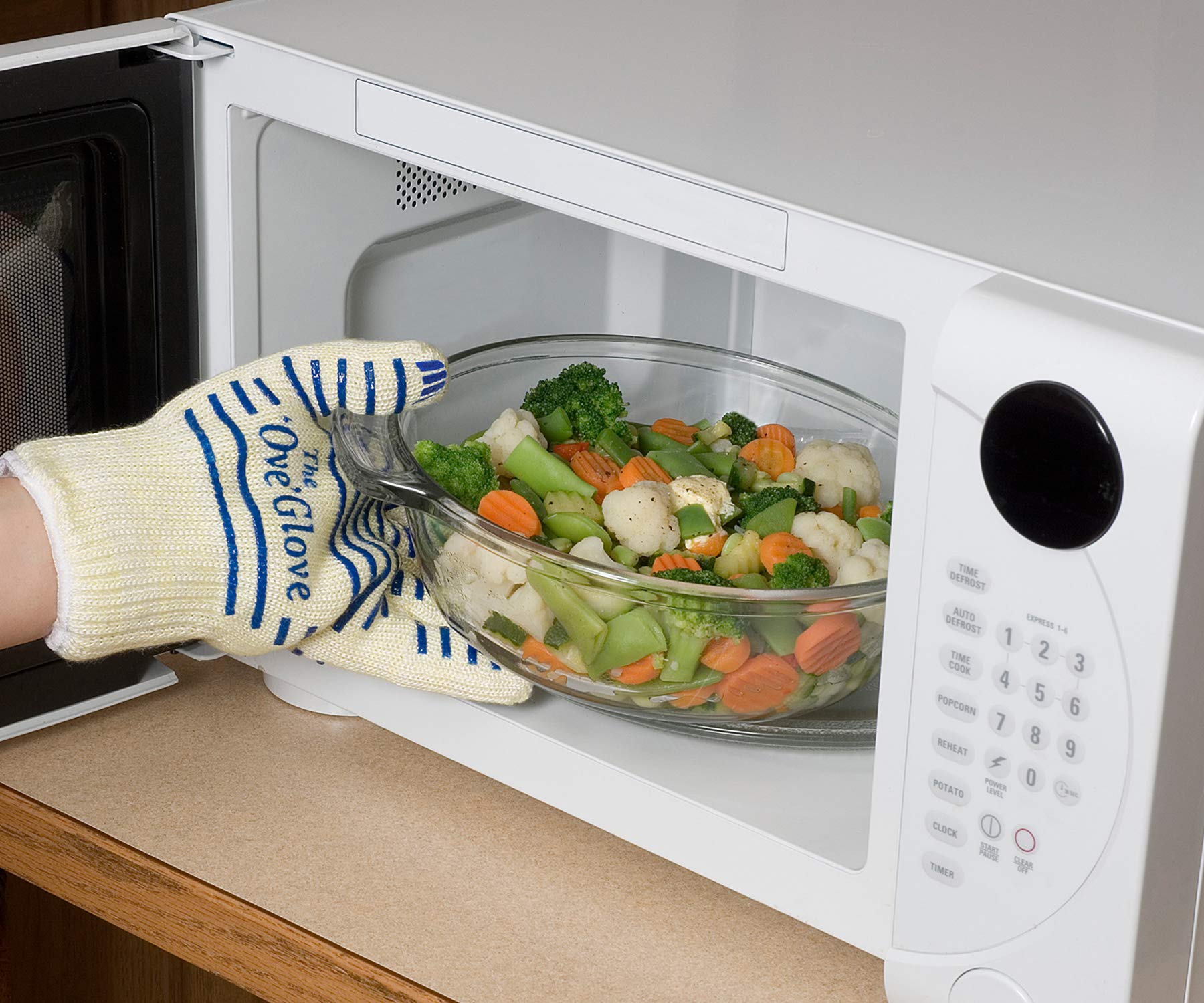 Ove Glove in a kitchen setting illustrating practical everyday heat handling